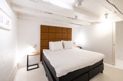 Bedroom at Yays Zoutkeetsgracht's one-bedroom grand apartment type in Amsterdam